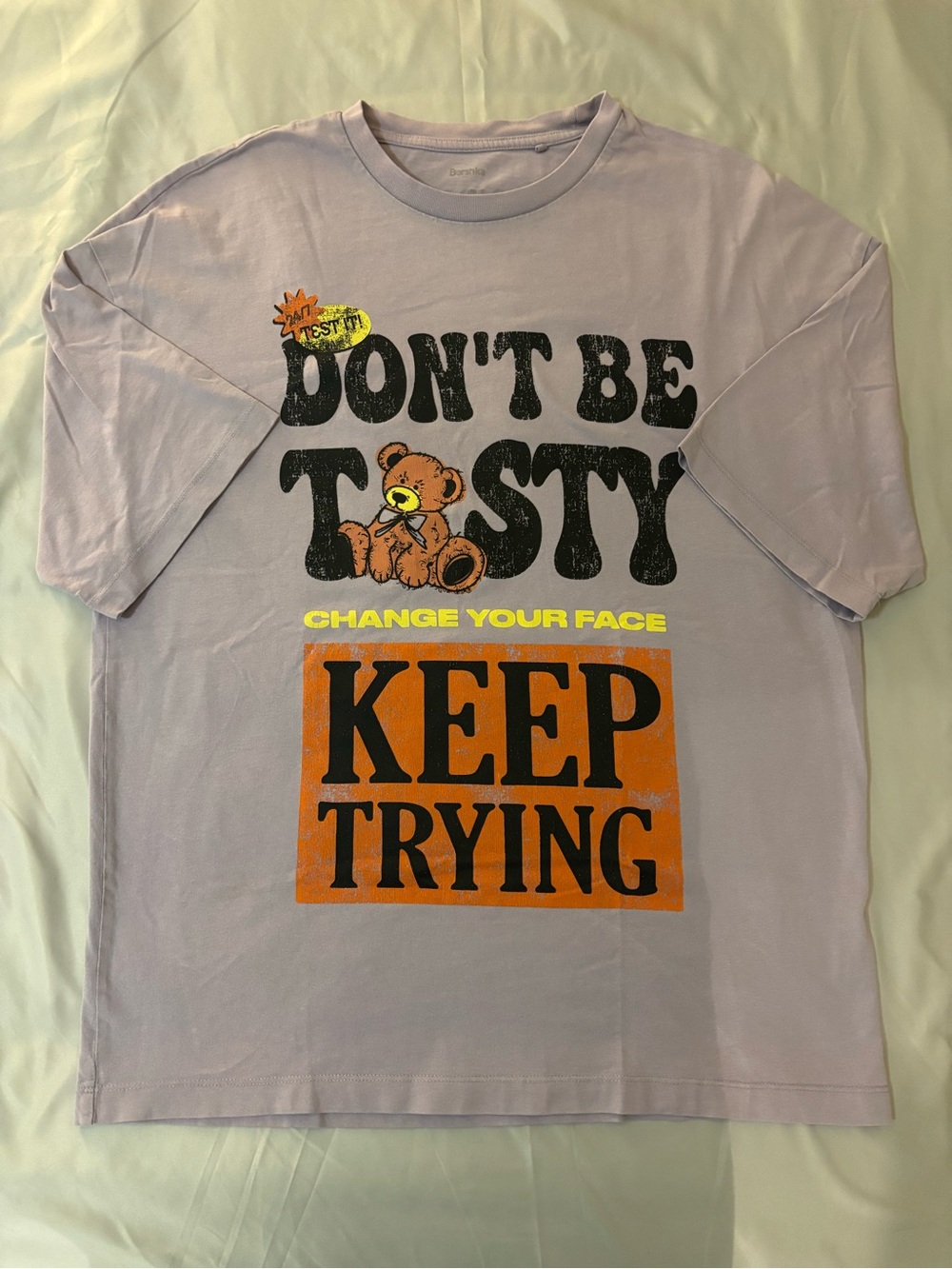 Bershka Lilac Graphic Tee with Black & Orange Print